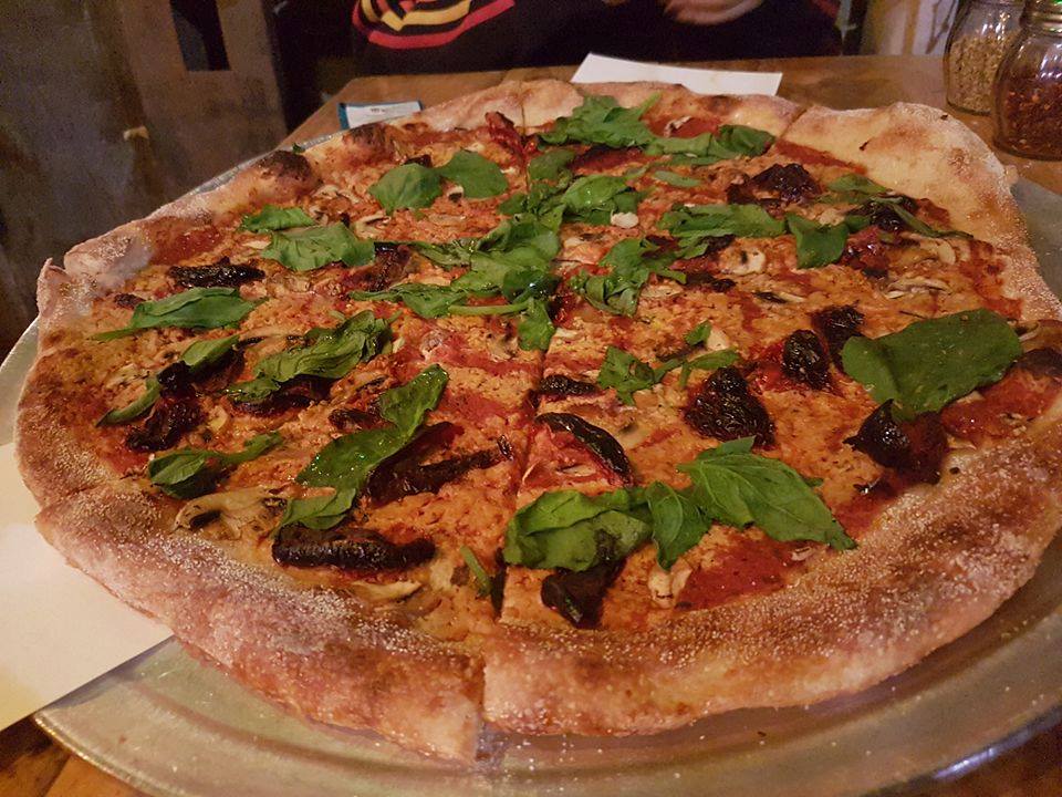 Green Cat pizzeria has interesting toppings and the cheese is completely vegan